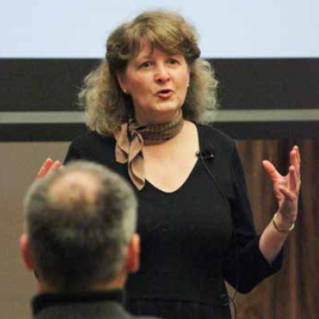A person giving a presentation to an audience.