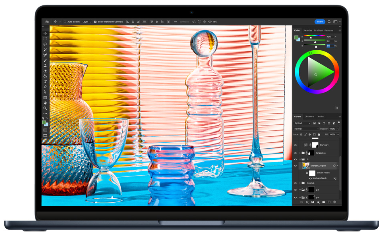 An image of the Apple MacBook Air laptop with the M2 processor showing the display open with a sample image shown.
