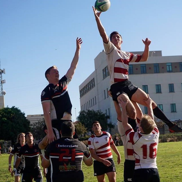 SCU students playing intramural rugby 