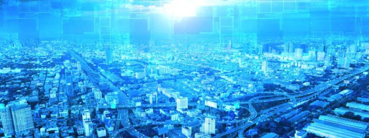 A futuristic cityscape under a bright sun in a blue sky. image link to story