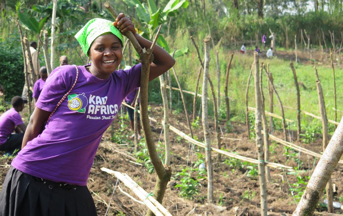 Young woman farming passion fruit