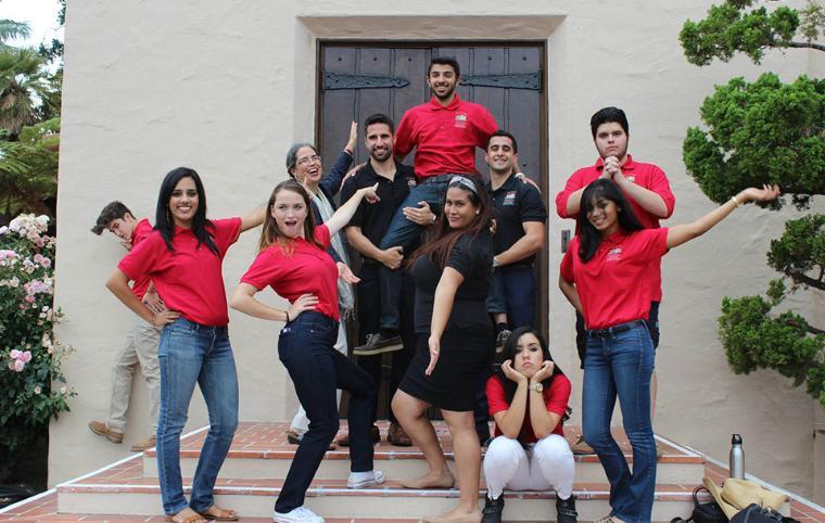 A group of people posing together outdoors. image link to story