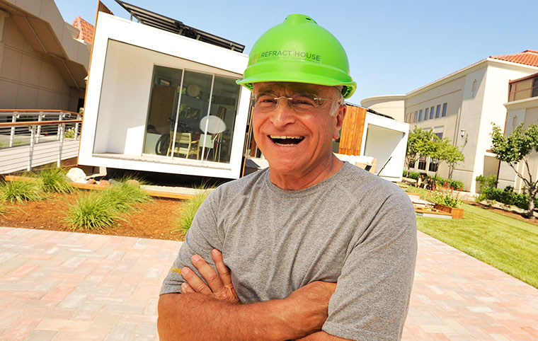 Fr. Reites outside the Refract Solar Decathlon house 
