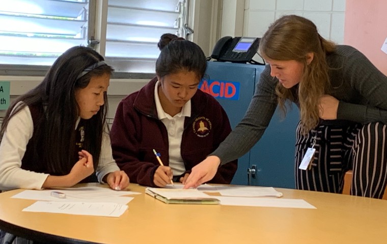 Three ECP students around table