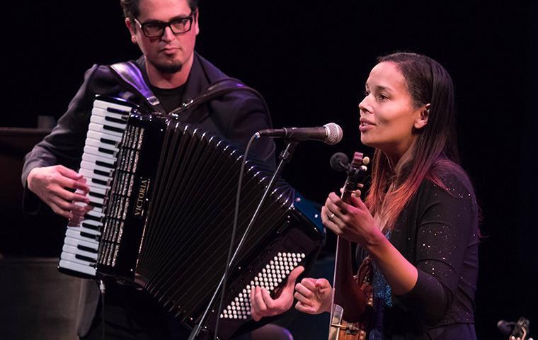 Photograph of Rhiannon Giddens performing onstage with Francesco Turrisi at SCUs Mayer Theatre.