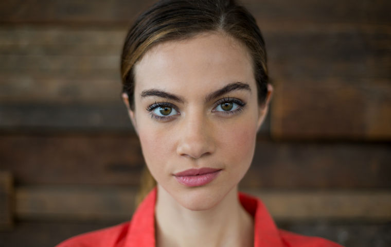 Picture of woman in red shirt image link to story
