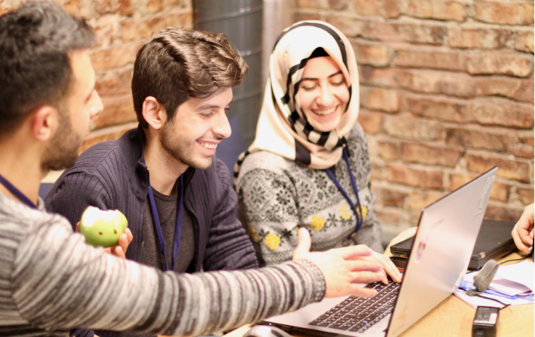 Three people who are part of Re-Coded, a participant in Miller Center SEM cohort