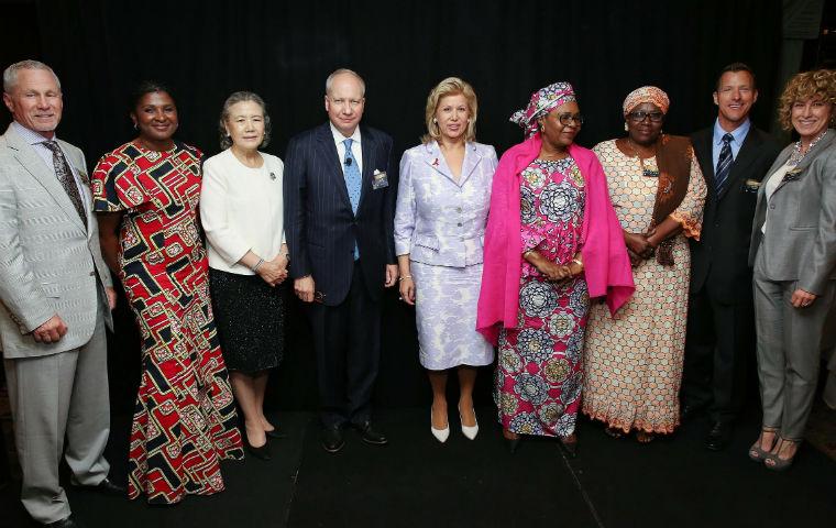 First Ladies of Africa with MillerCtr execs image link to story