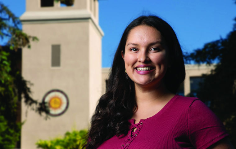 Areli Hernandez smiling just outside SCU's campus  image link to story