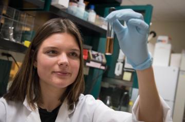 Bioengineering student Claire Hultquist works on a project to detect cervical cancer. Photo by Charles Barry