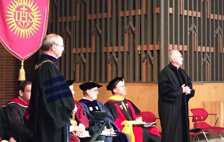 Fr. Engh and Fr. Cozzens at JST 2016 commencement image link to story