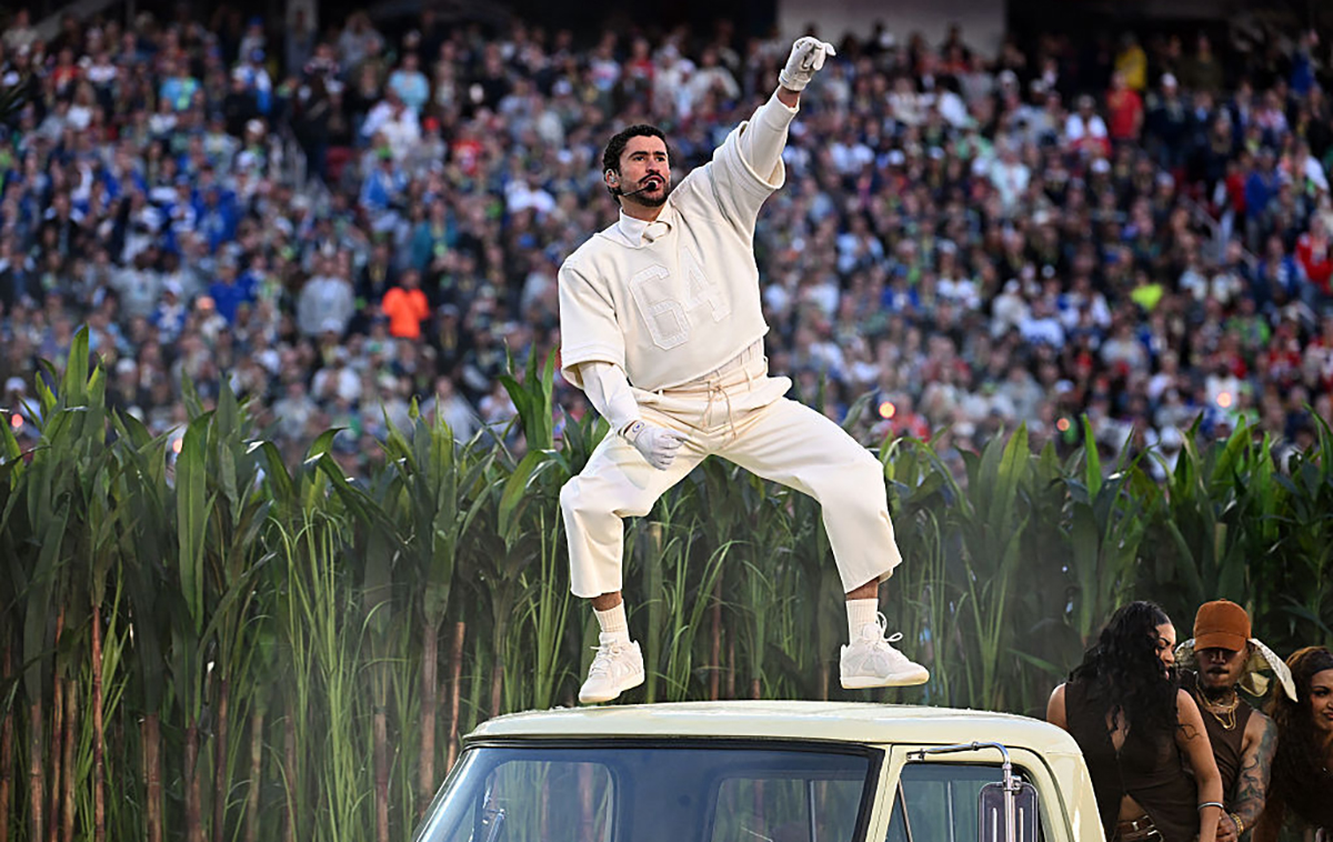 Bad Bunny performing on top of car at Super Bowl 2026