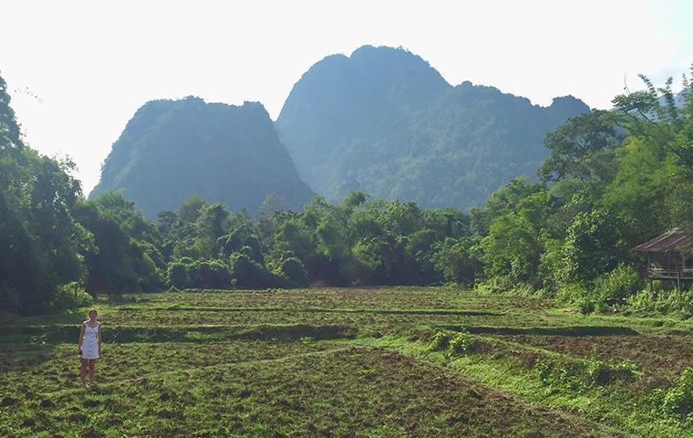 Hana Seastedt and her mountain backdrop in Laos.