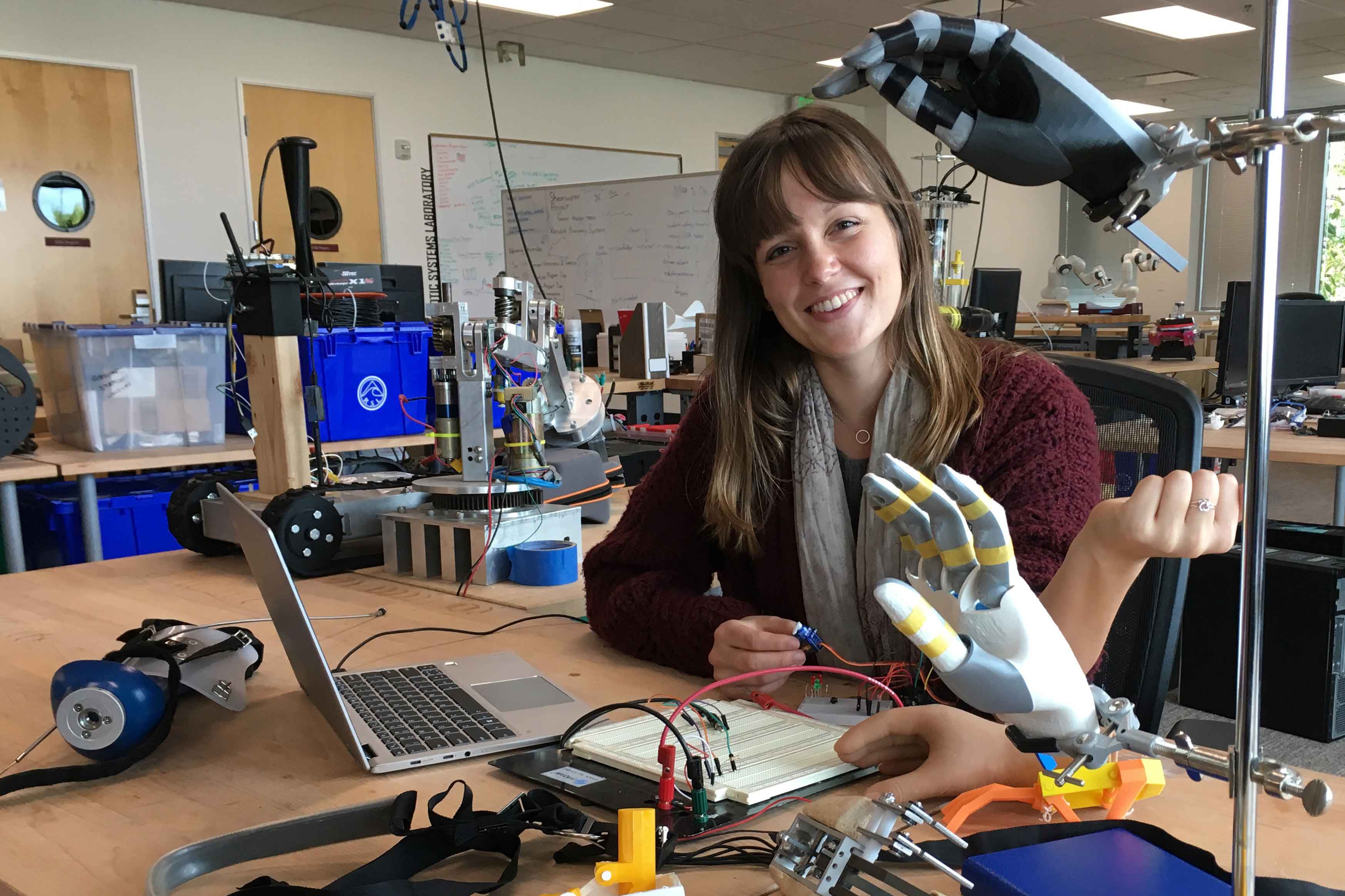 Jamie Ferris in the robotics systems lab image link to story