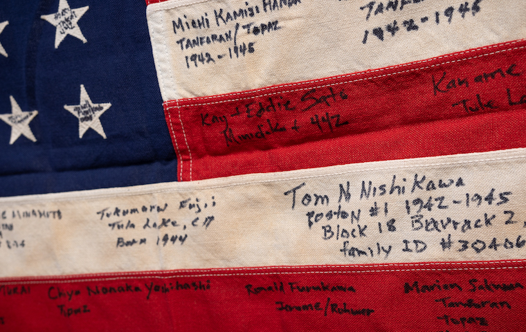 A 1948 American flag recently signed by Japanese Americans survivors of U.S. incarceration camps during WW II.
