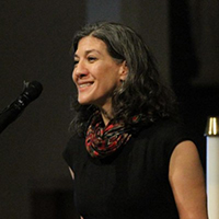 Julie Rubio at lectern