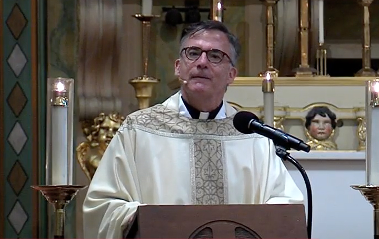 Fr. Kevin O'Brien delivering his homily at the Feast of St. Ignatius image link to story