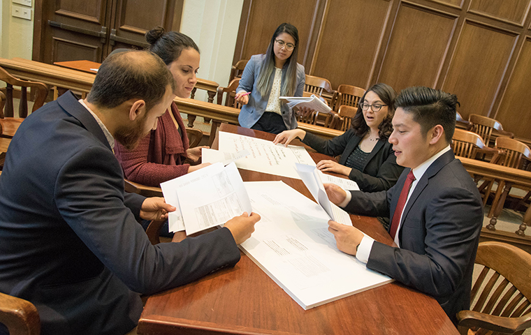 Law students working around a table
