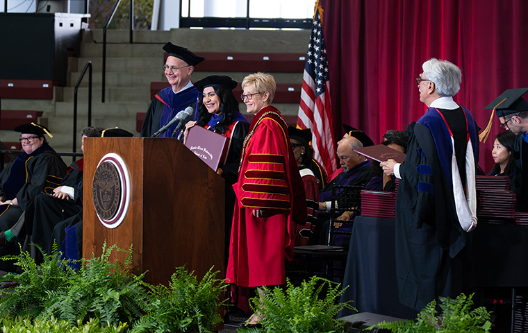 Dean Kaufman and President Sullivan on stage at Law Commencement 2023 image link to story