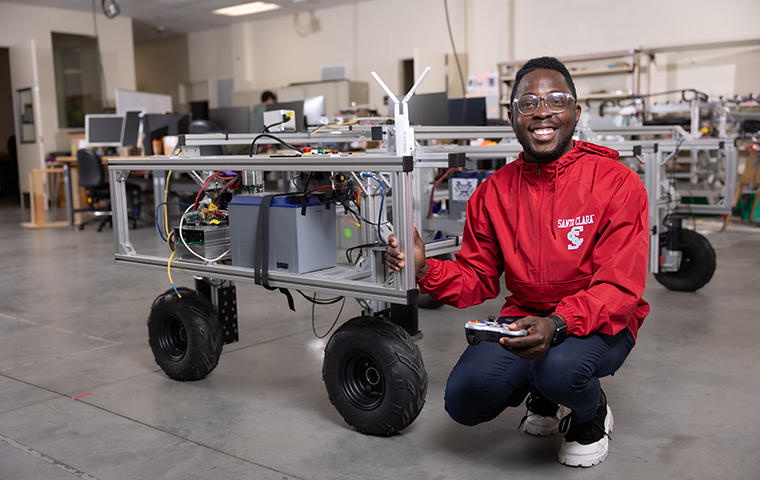 Michael Aboh with agricultural robot