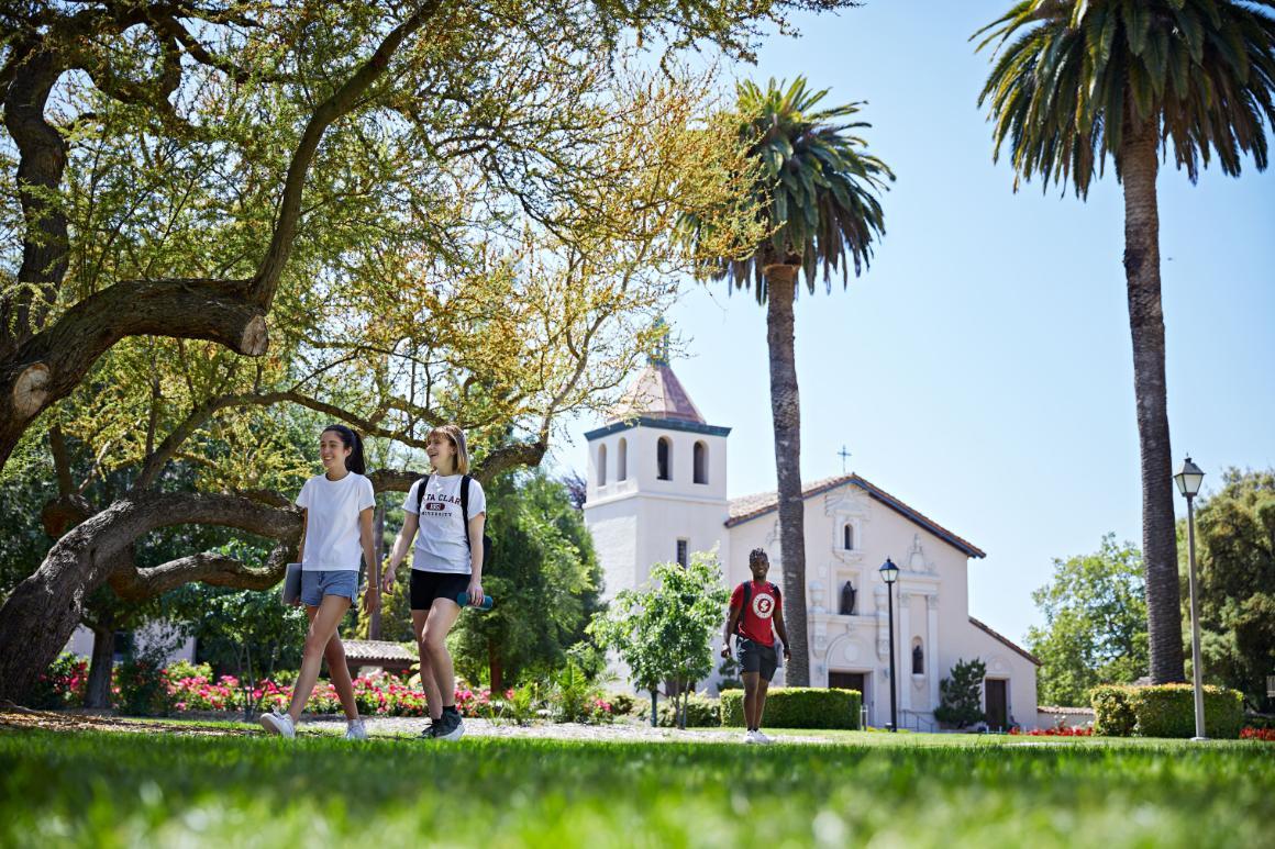 SCU students walking outside the Mission Church