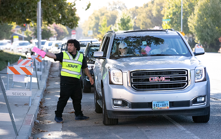 Campus security officer directing traffic for move-in