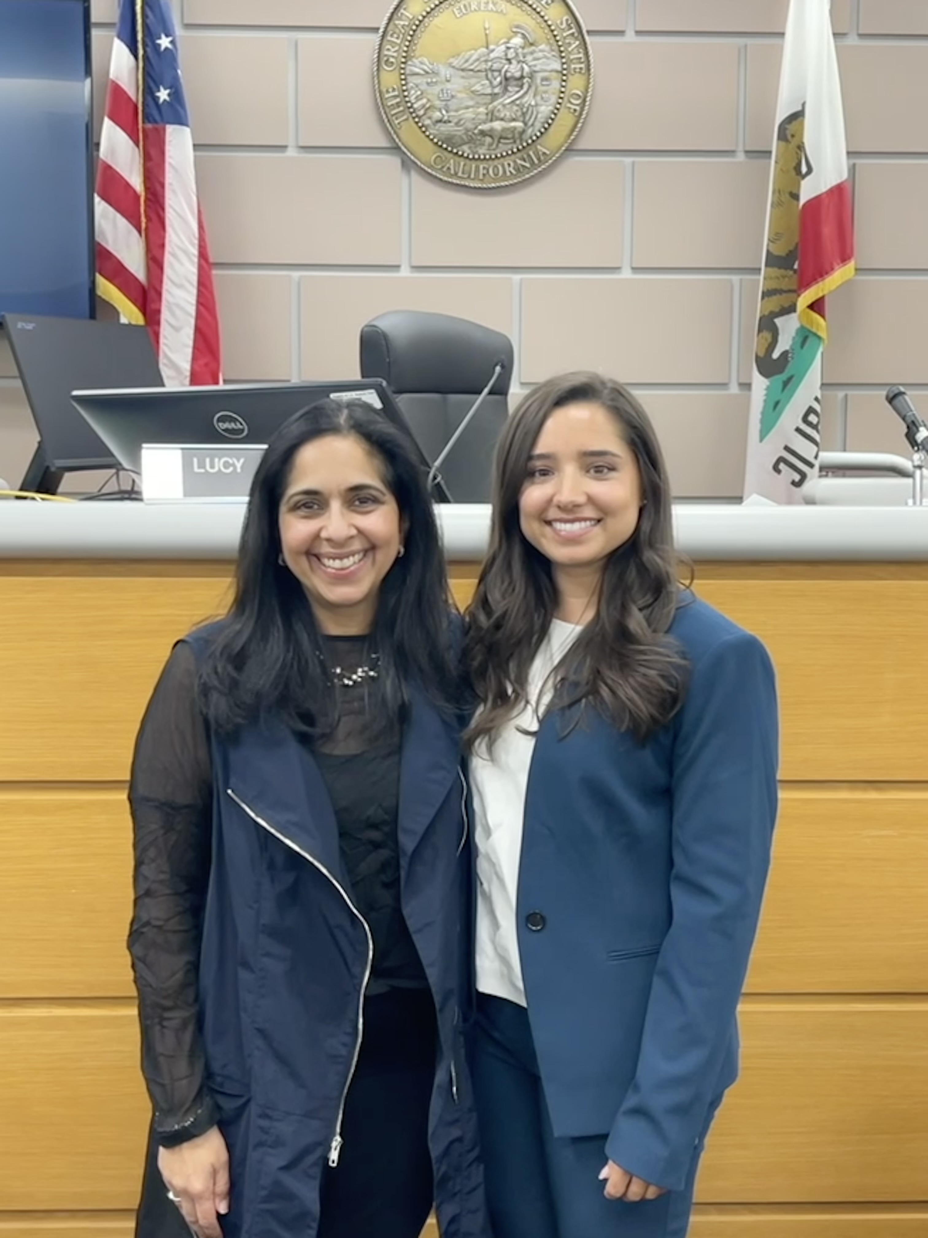 Sharmila Lodhia, associate professor and chair of the Women's and Gender Studies department, pictured with Mirelle Raza at her swearing-in ceremony.