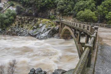 SC Magazine photo of flowing river and bridge