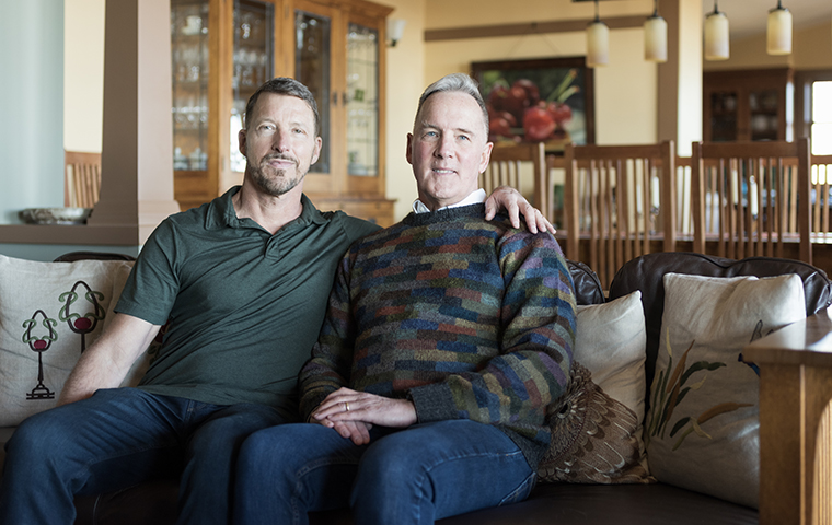 Photo of Thane Kreiner and Steve Lovejoy seated on a couch.