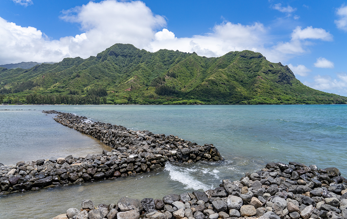 Huilua Fishpond, in Ahupuaʻa O Kahana State Park on windward Oʻahu, is one of the few surviving ancient Hawaiian fishponds that were still operational well into the 20th century. Honolulu, Oahu, Hawaii