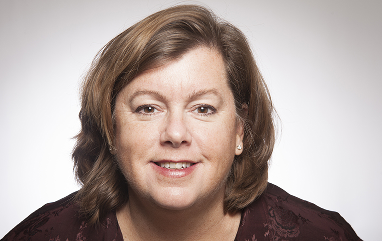 A woman smiling, titled 'Ann Skeet'. image link to story