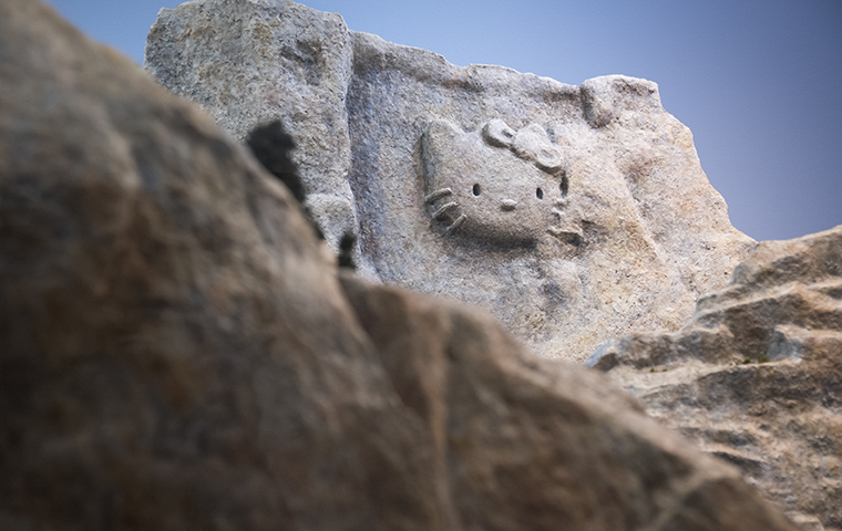 Hello Kitty's face carved into the side of a mountain image link to story