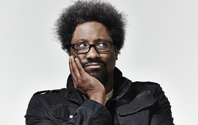 W. Kamau Bell looking to the right of frame