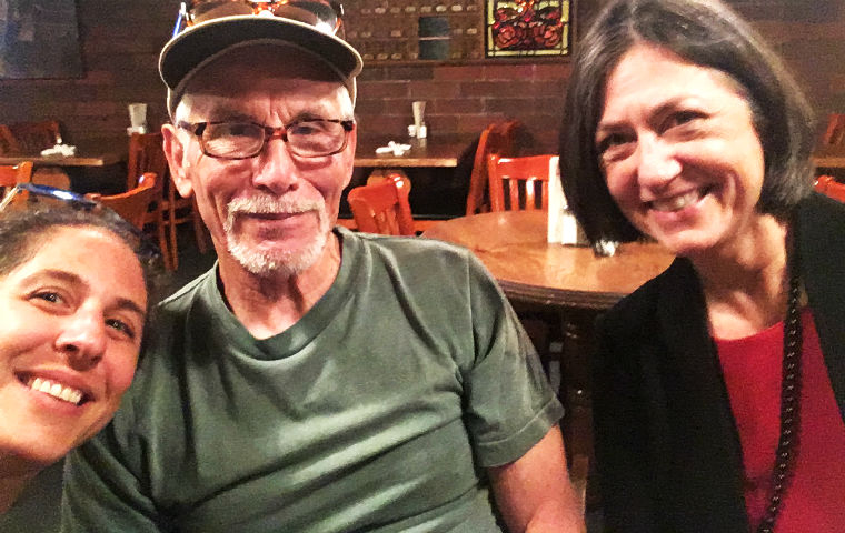 Exonerated man Ed Easley is pictured (center) with his NCIP lawyers Paige Kaneb and Linda Starr