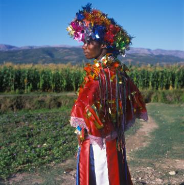 Man dressed in costume for the Haitian vodou festival, Rara. Photo courtesy of Haiti ©Phyllis Galembo.