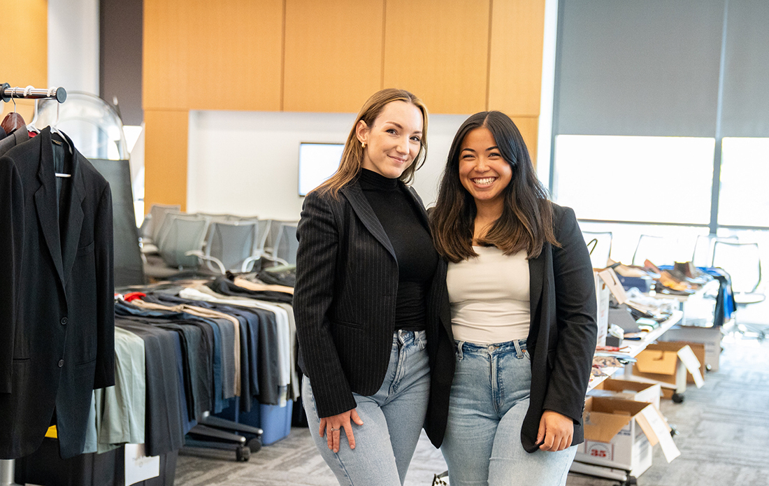 SCU law students Victoire Marion (left) and Kalena Paredes, oversaw the clothing drive.