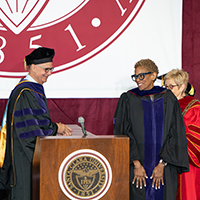 Speaker Vernā Myers receiving an honorary degree at commencement for Santa Clara Law Class of 2024