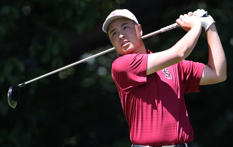 Men's golfer Hayden Shieh holding the follow through on his swing image link to story