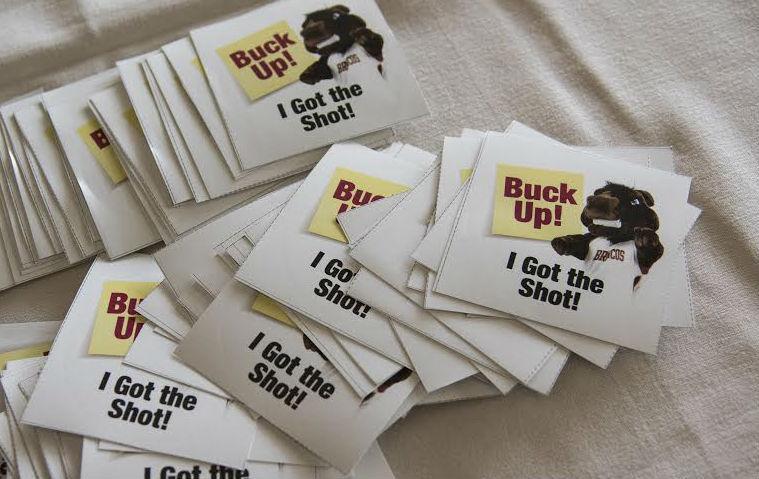 Vaccination stickers feb2016 image link to story