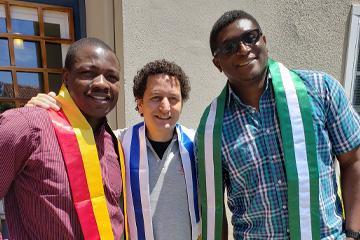 Three International male students together smiling 