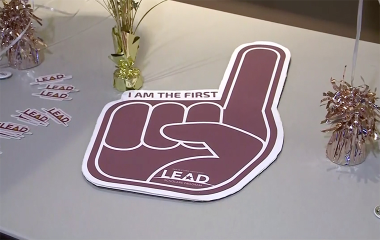 A paper cutout of a hand that says first-generation students are No. 1