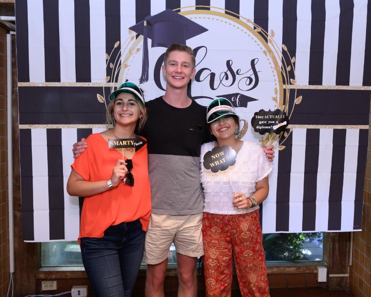 Friends posing at BBQ