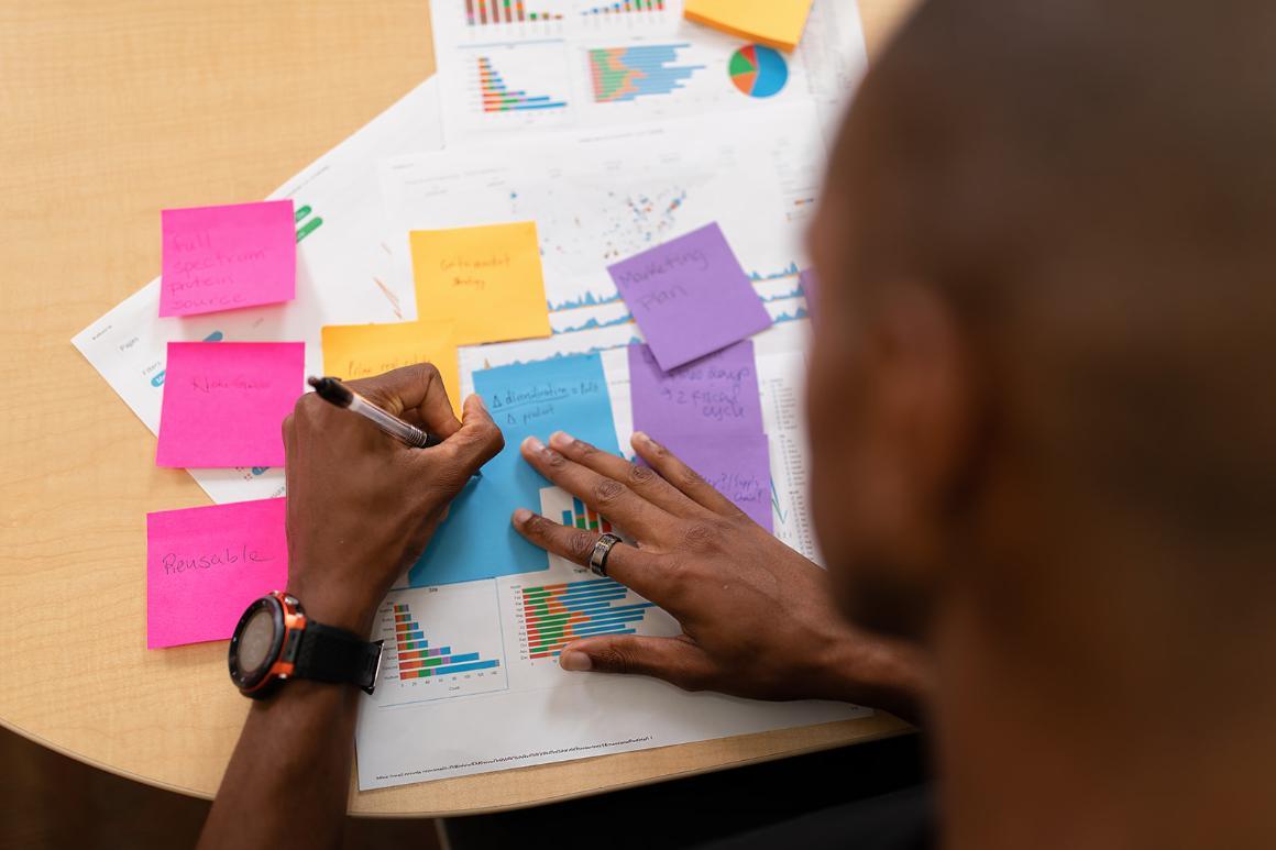 Student studying with bright colored note cards