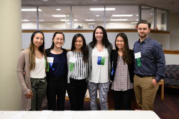 A group of six people smiling at the 19th Annual Accounting Awards Banquet.