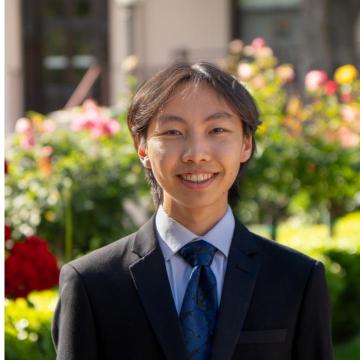 Matthew Leung, SCU Accounting Association. Smile, suit, tie.