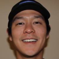 Cory Hiromoto pictured with his diploma