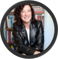 Shannon Riordan in leather jacket smiling