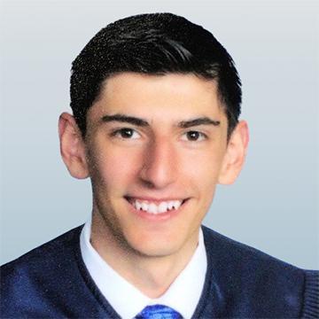 Man in suit and tie smiling