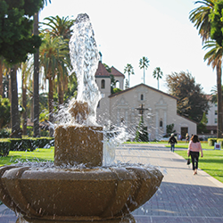 Picture of Sobrato fountain with Mission Church in the background 