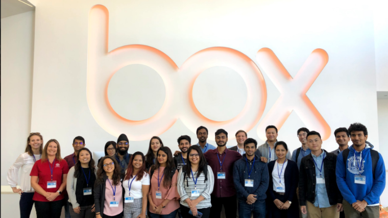 Students attend career trek to Box and pose for photo in front of company sign.